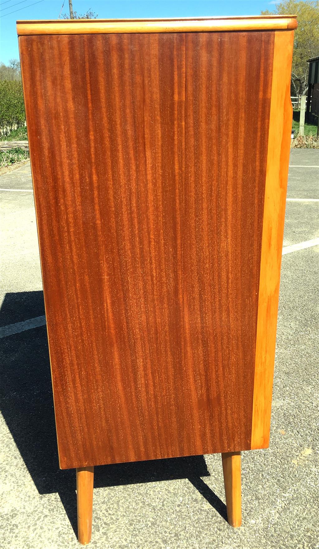 A mid century design mahogany and teak five drawer chest, circa 1960, width 77cm, depth 45cm, height 107cm